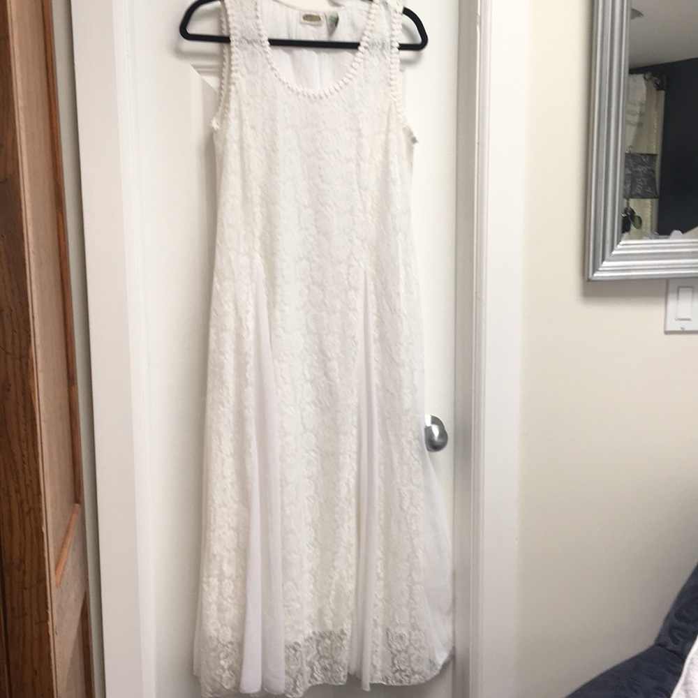 Romantic creamy white lace. White inserts